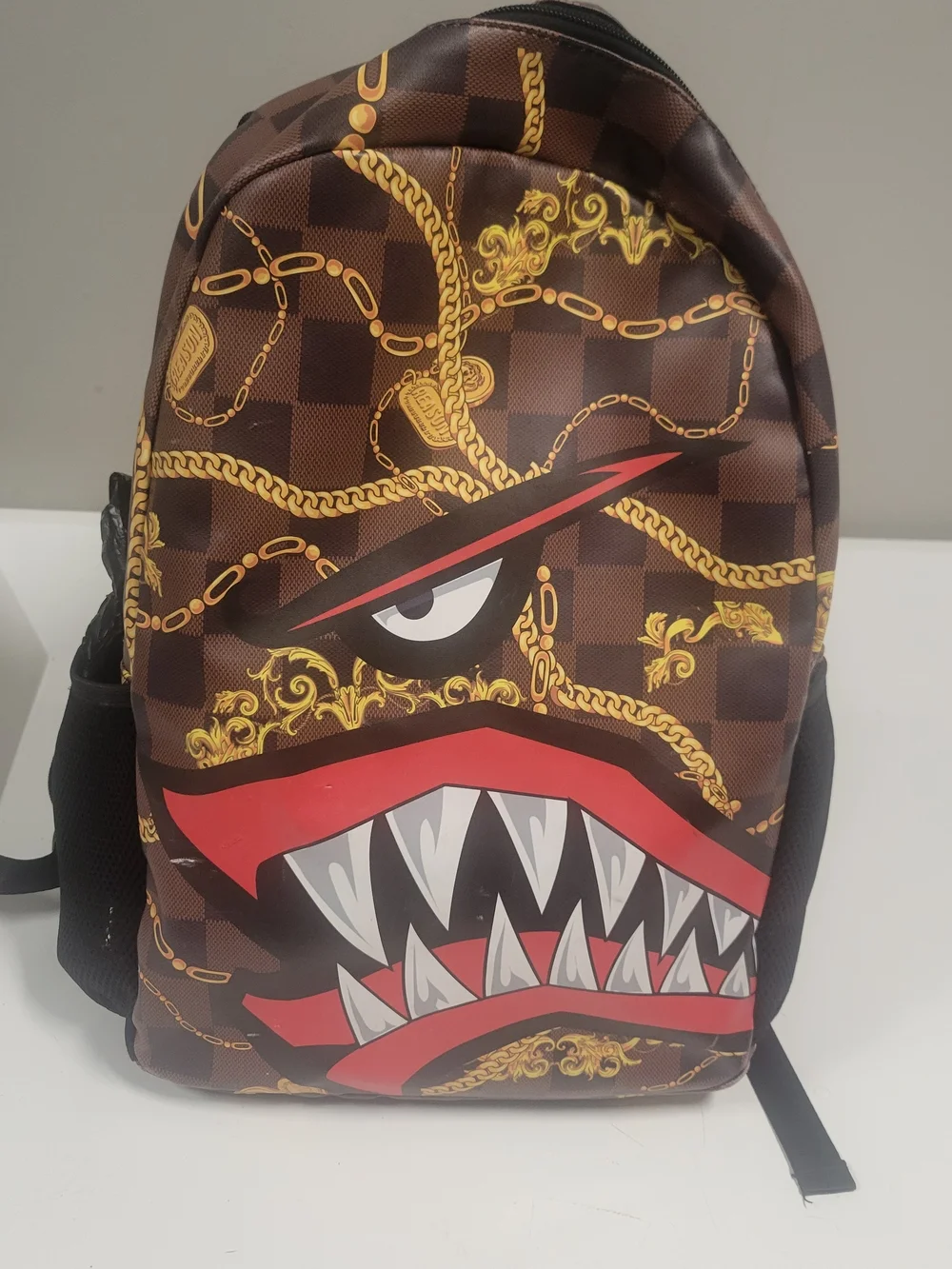 Reason Clothing Shark Mouth Brown Graphic Backpack with Red Accent